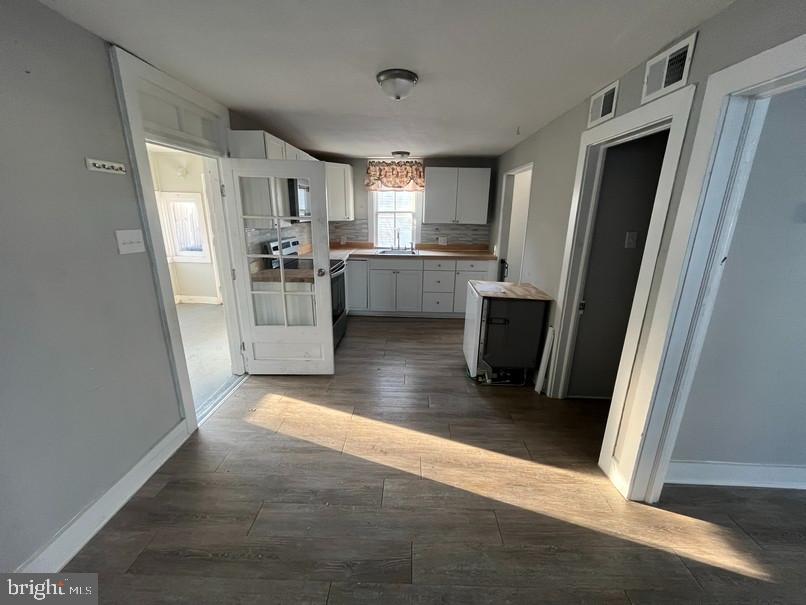 81 Main Street Yorkana, PA 17406 - Photo 7 of 16 a view of a kitchen with furniture and wooden floor