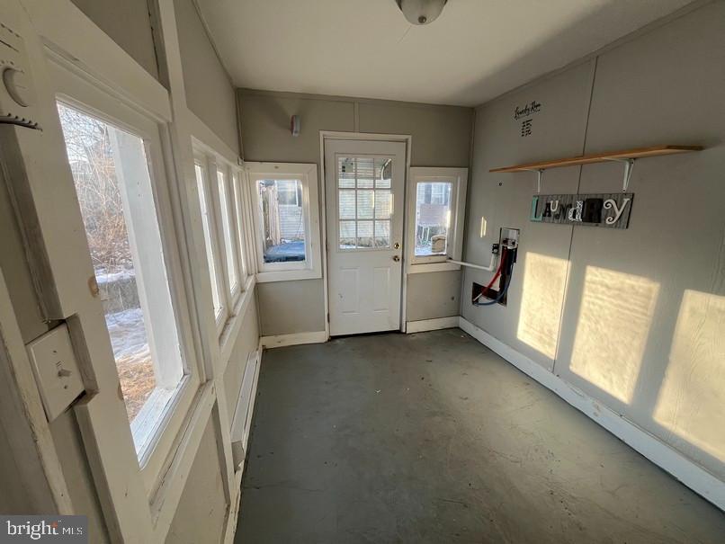 81 Main Street Yorkana, PA 17406 - Photo 8 of 16 a view of hallway with furniture and a window