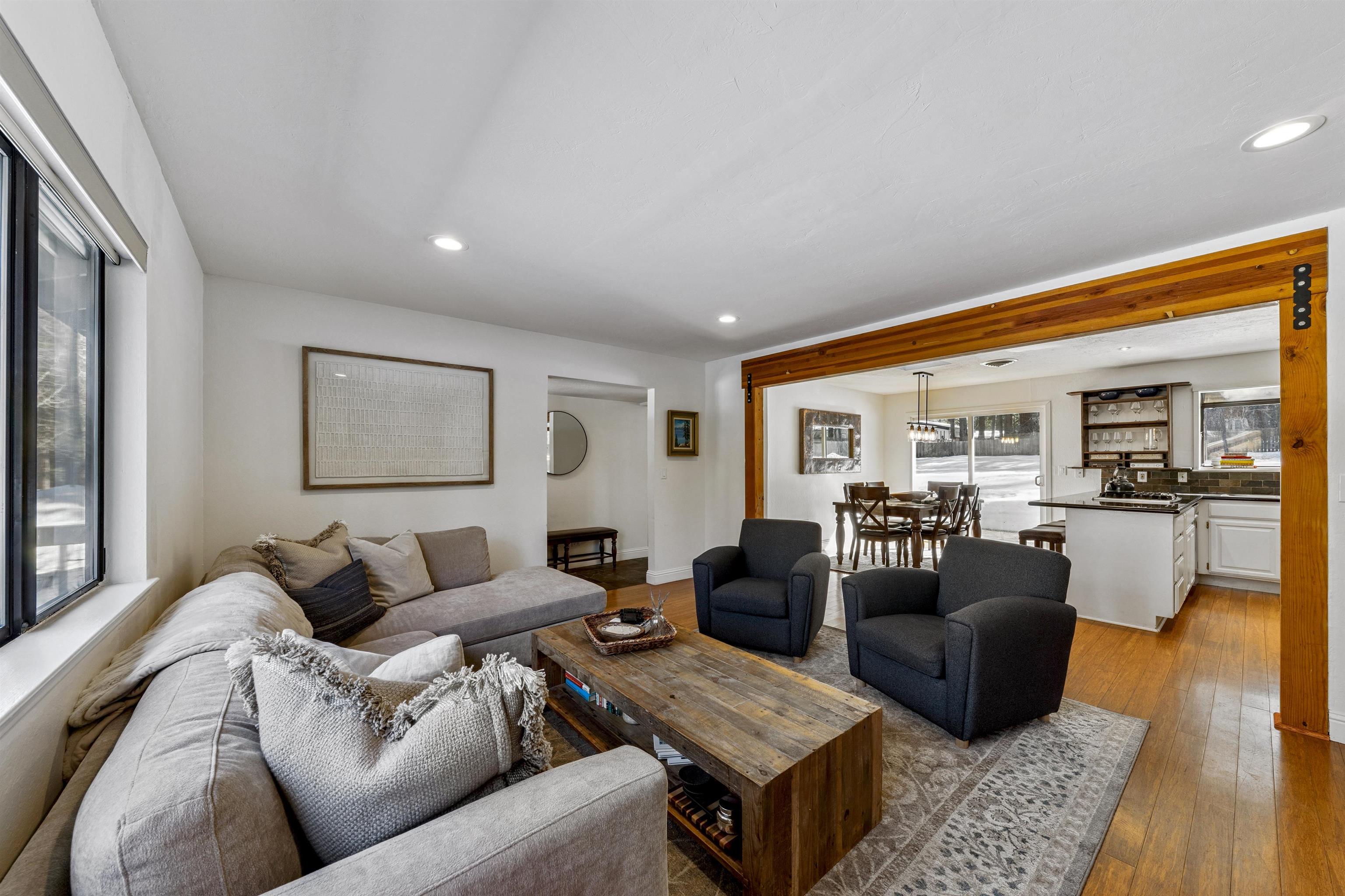 10895 Jeffery Pine Road Truckee, CA 96161 - Photo 10 of 25 a living room with furniture and a table
