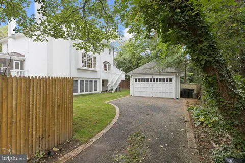 a view of a sign board with a big yard