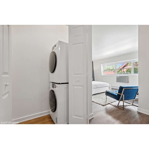 1908 Green Bay Road, Unit H Highland Park, IL 60035 - Photo 7 of 9 a living room with furniture and a window