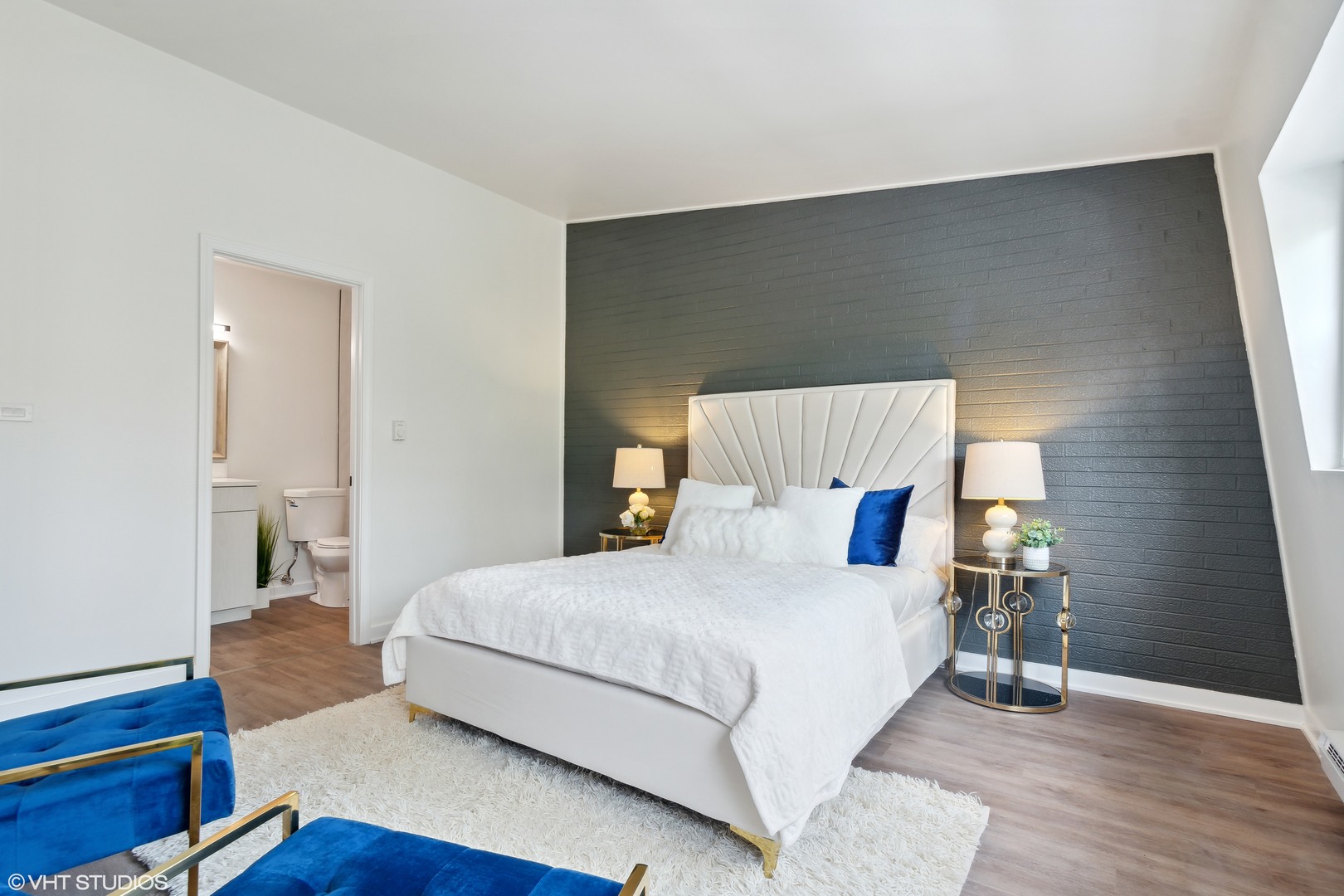 1908 Green Bay Road, Unit H Highland Park, IL 60035 - Photo 8 of 9 a bedroom with a bed and wooden floor