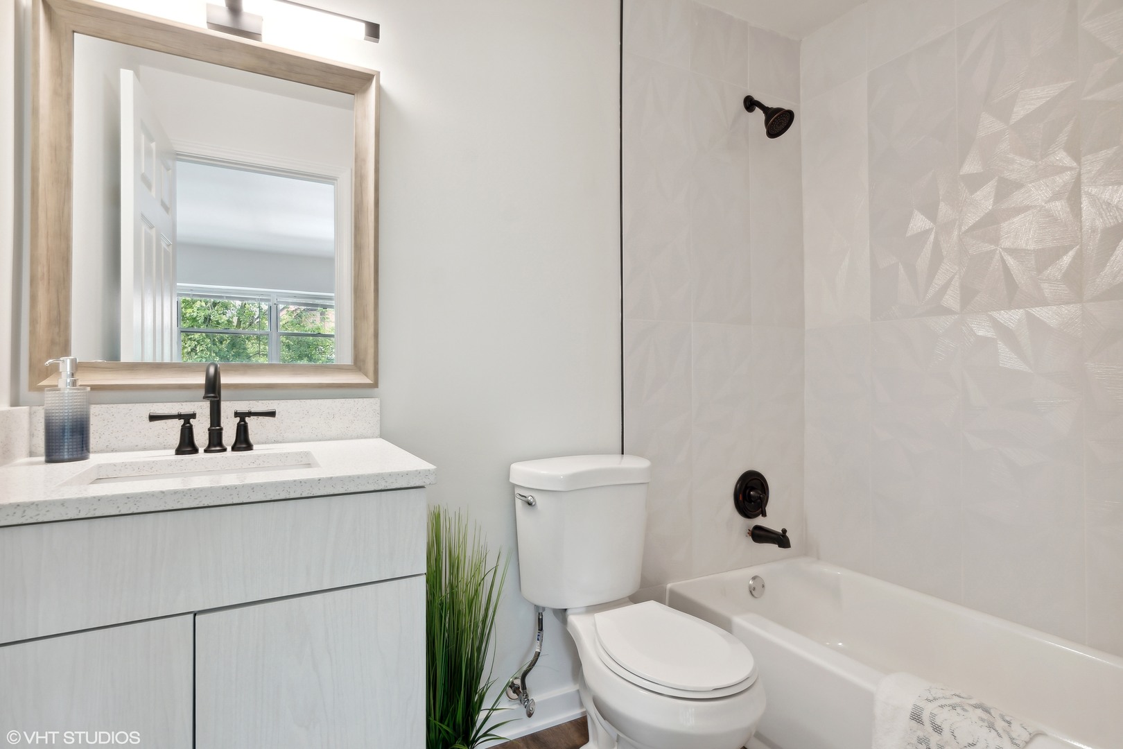 1908 Green Bay Road, Unit H Highland Park, IL 60035 - Photo 9 of 9 a bathroom with a sink toilet and shower