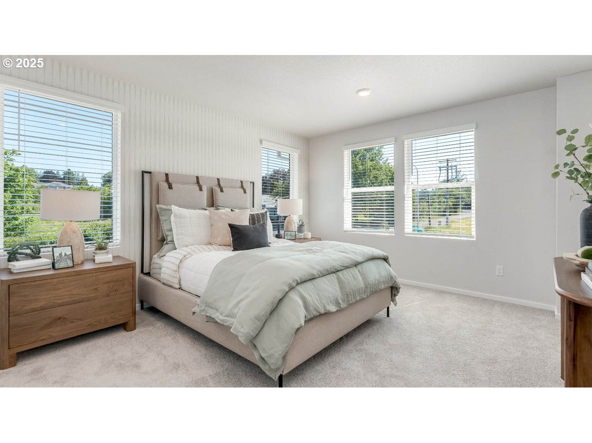 3541 Southwest Thomas Avenue Gresham, OR 97080 - Photo 20 of 25 a living room with a bed furniture and a window
