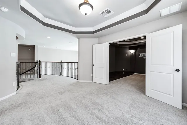 a view of a house with backyard porch and sitting area