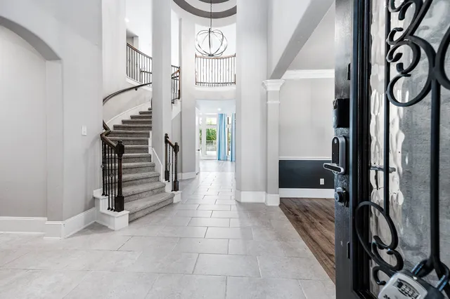 a living room with fireplace furniture and a flat screen tv