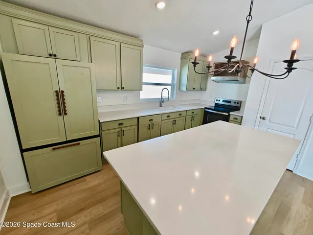 a view of livingroom with hardwood and furniture