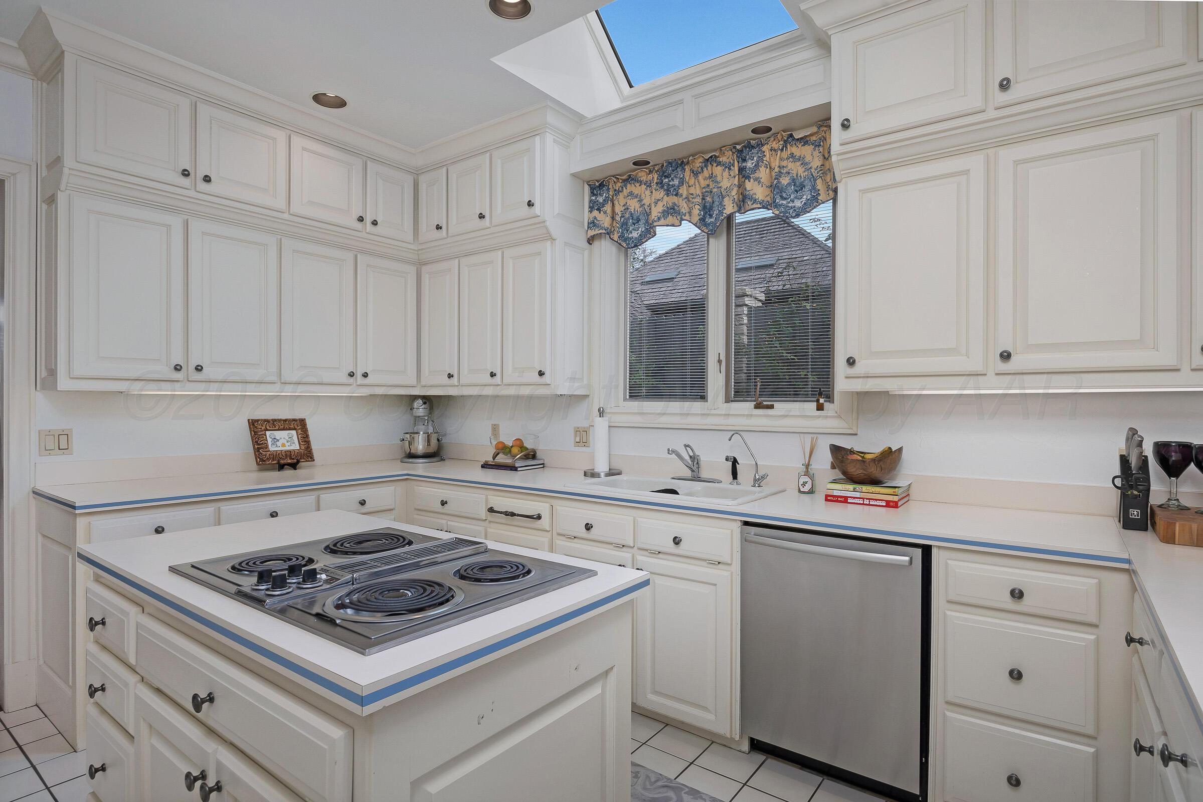 1 Gunn Court Amarillo, TX 79106 - Photo 15 of 36 a view of a kitchen with sink and cabinets