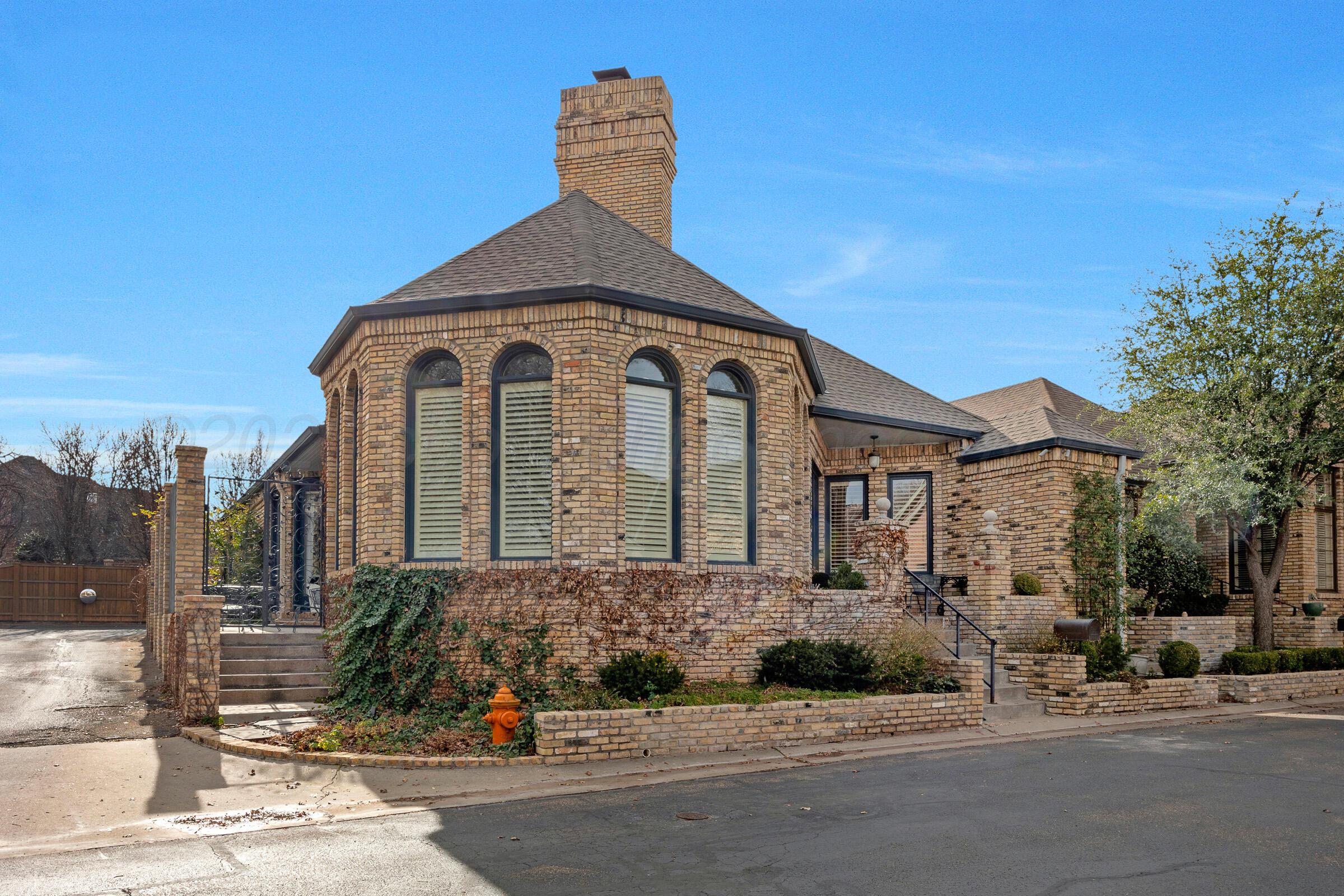 1 Gunn Court Amarillo, TX 79106 - Photo 2 of 36 a front view of a house with a yard