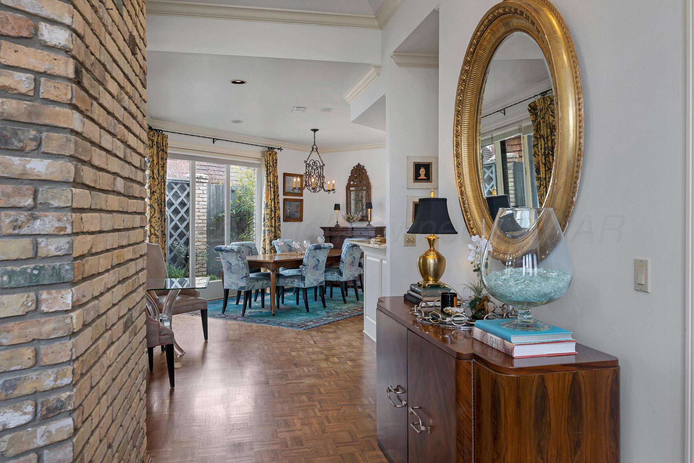 1 Gunn Court Amarillo, TX 79106 - Photo 9 of 36 a dining room with furniture and wooden floor