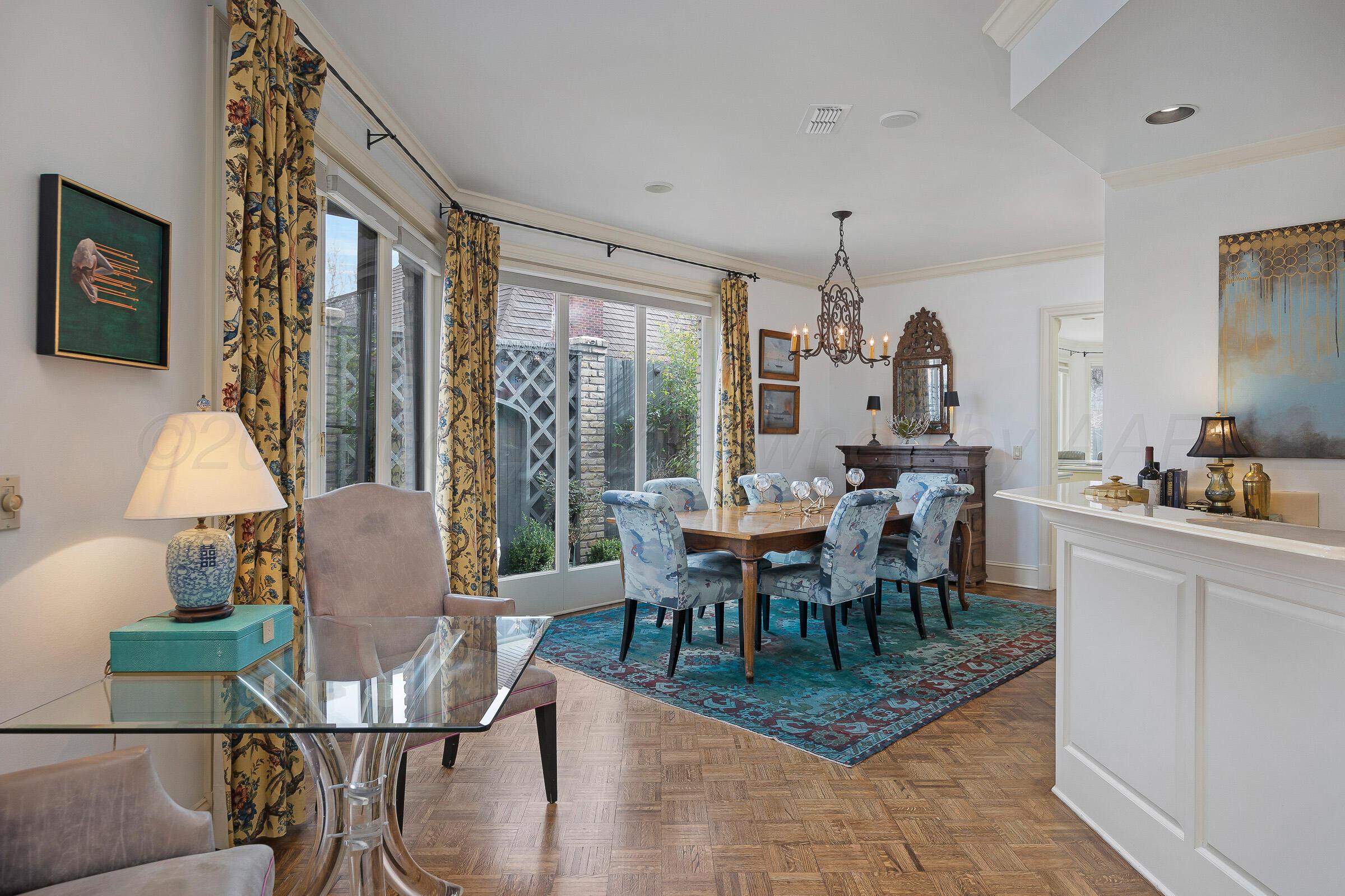 1 Gunn Court Amarillo, TX 79106 - Photo 10 of 36 a view of a dining room with furniture window and wooden floor