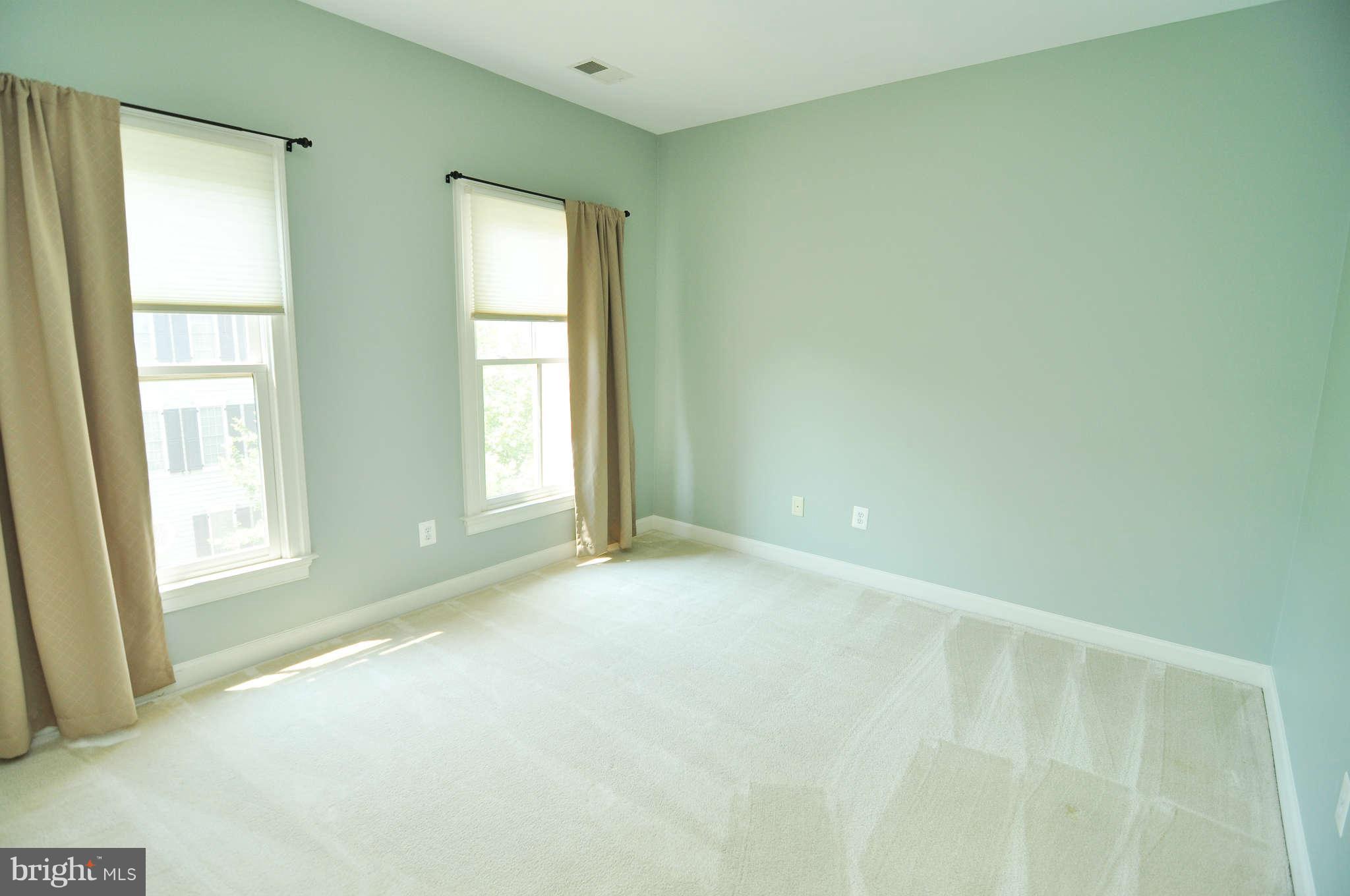 719 Carpenter Road Alexandria, VA 22314 - Photo 13 of 26 a view of an empty room with a window