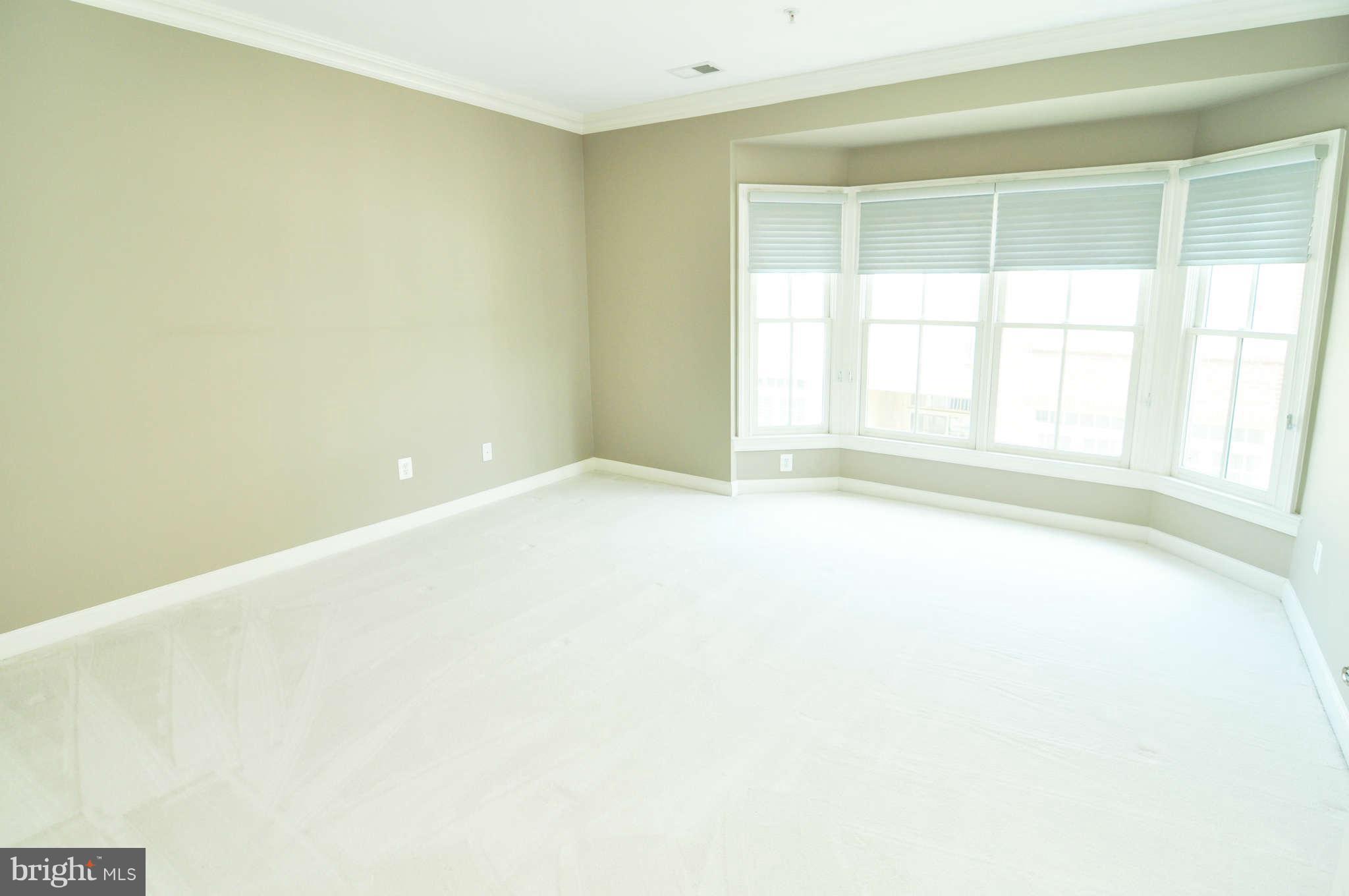 719 Carpenter Road Alexandria, VA 22314 - Photo 16 of 26 a view of an empty room with a window