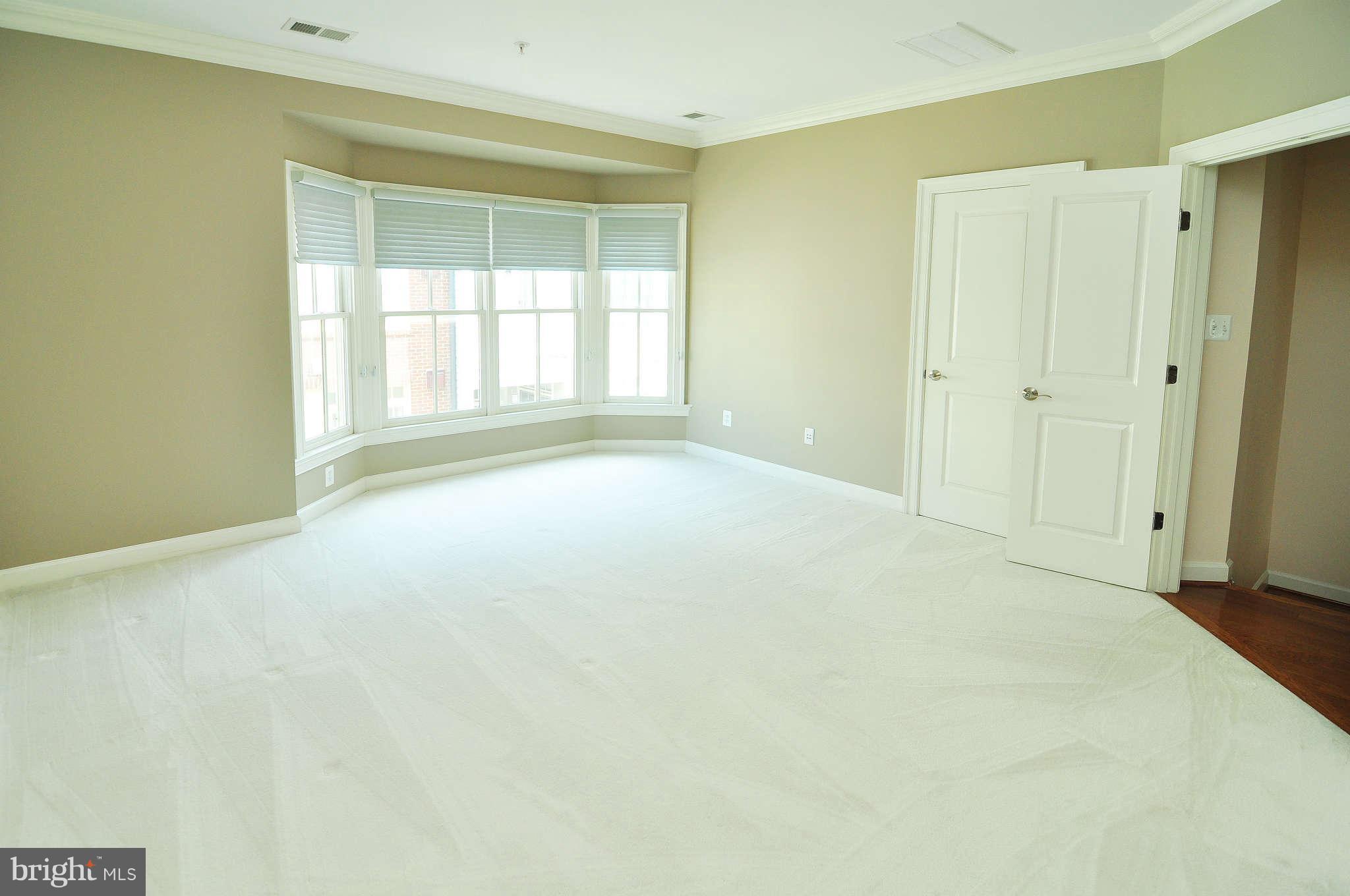719 Carpenter Road Alexandria, VA 22314 - Photo 17 of 26 a view of an empty room with a window