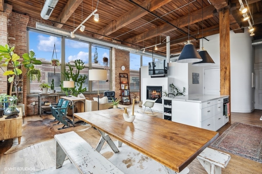 1500 West Monroe Street, Unit 425 Chicago, IL 60607 - Photo 13 of 33 a view of a living room and kitchen