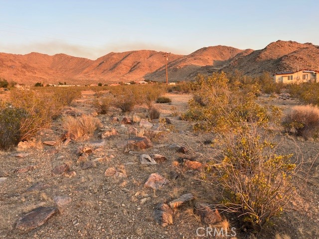 20 Old Mine Road Apple Valley, CA 92307 - Photo 6 of 6 a view of a mountain range in a cloudy sky