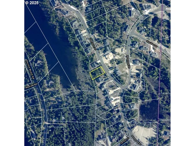 a view of balcony with wooden floor