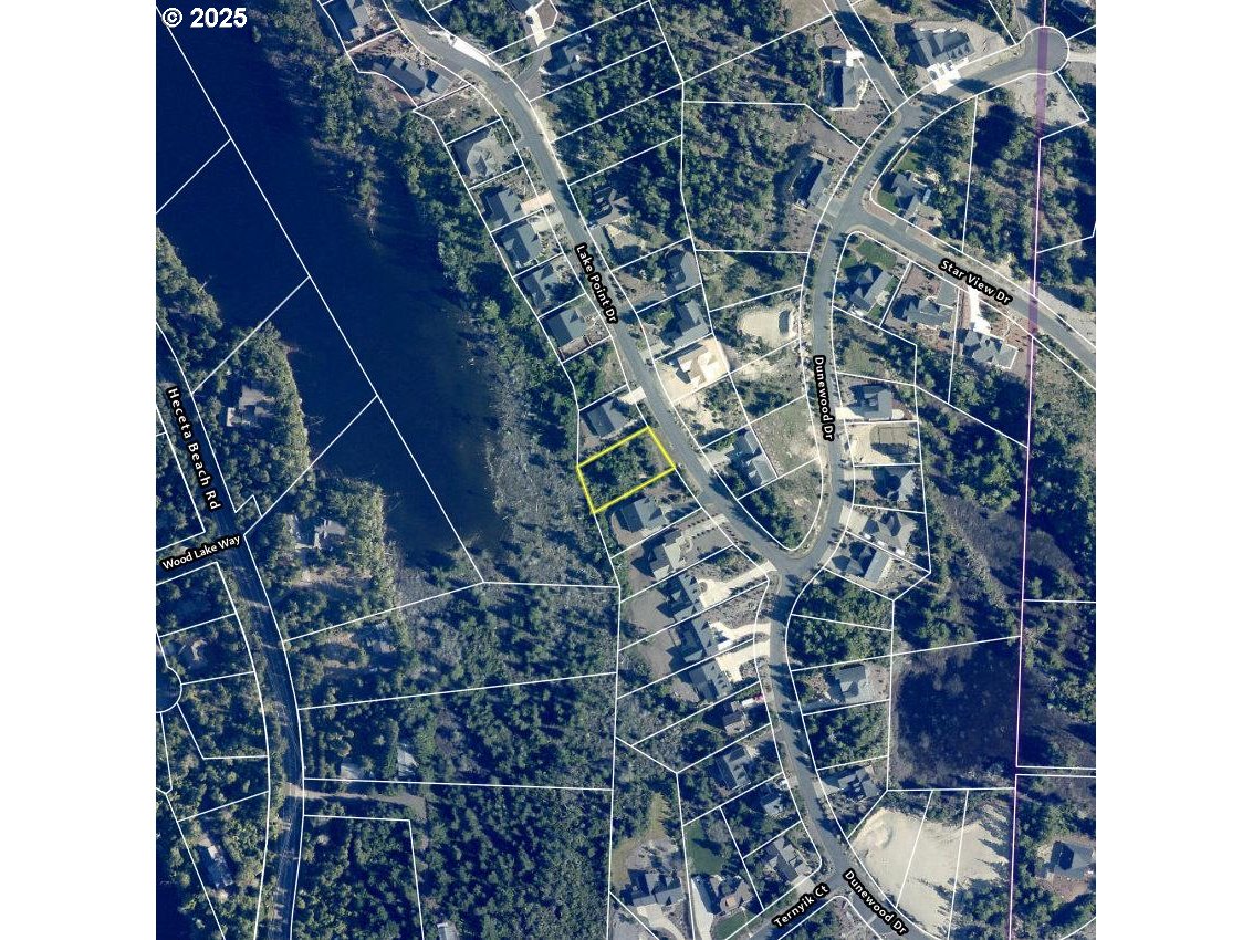 Lake Point Drive, Unit 23 Florence, OR 97439 - Photo 12 of 13 a view of balcony with wooden floor