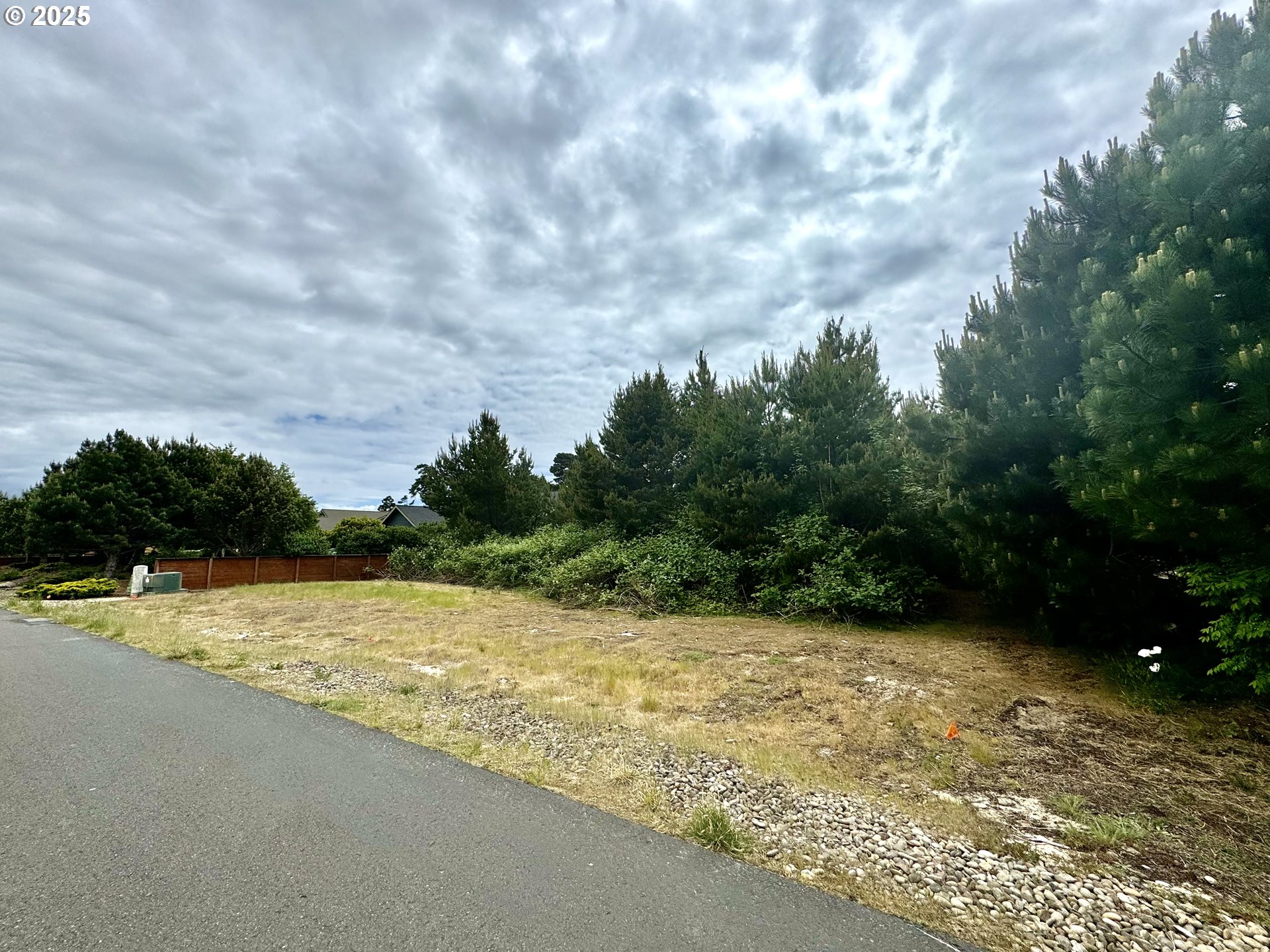 Lake Point Drive, Unit 23 Florence, OR 97439 - Photo 2 of 13 a view of an ocean and beach