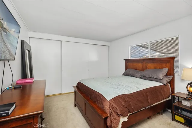 a room with a bed and a chair