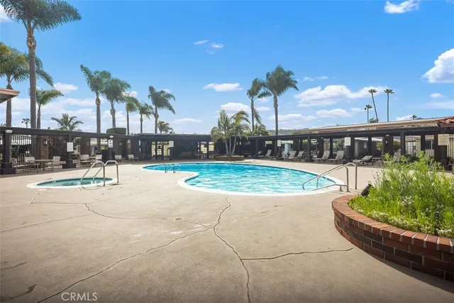 a view of a house with backyard and porch