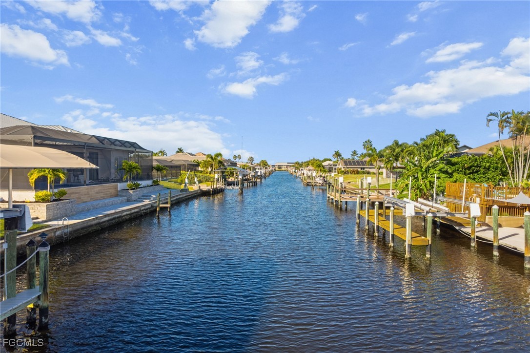 5025 Southwest 10th Avenue Cape Coral, FL 33914 - Photo 43 of 44 a view of a lake with houses