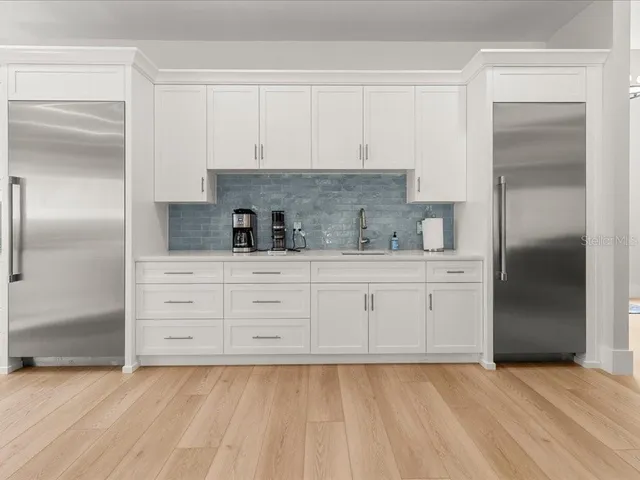 a room with furniture and a flat screen tv