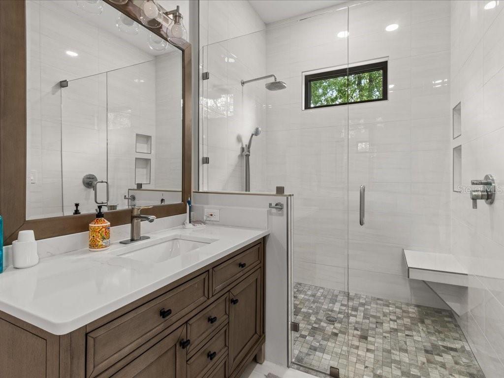 3937 West Shadow Creek Loop Lecanto, FL 34461 - Photo 18 of 65 a bathroom with a sink a toilet and shower
