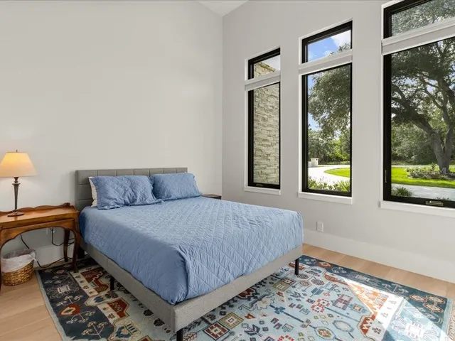 a bathroom with a toilet sink shower and mirror