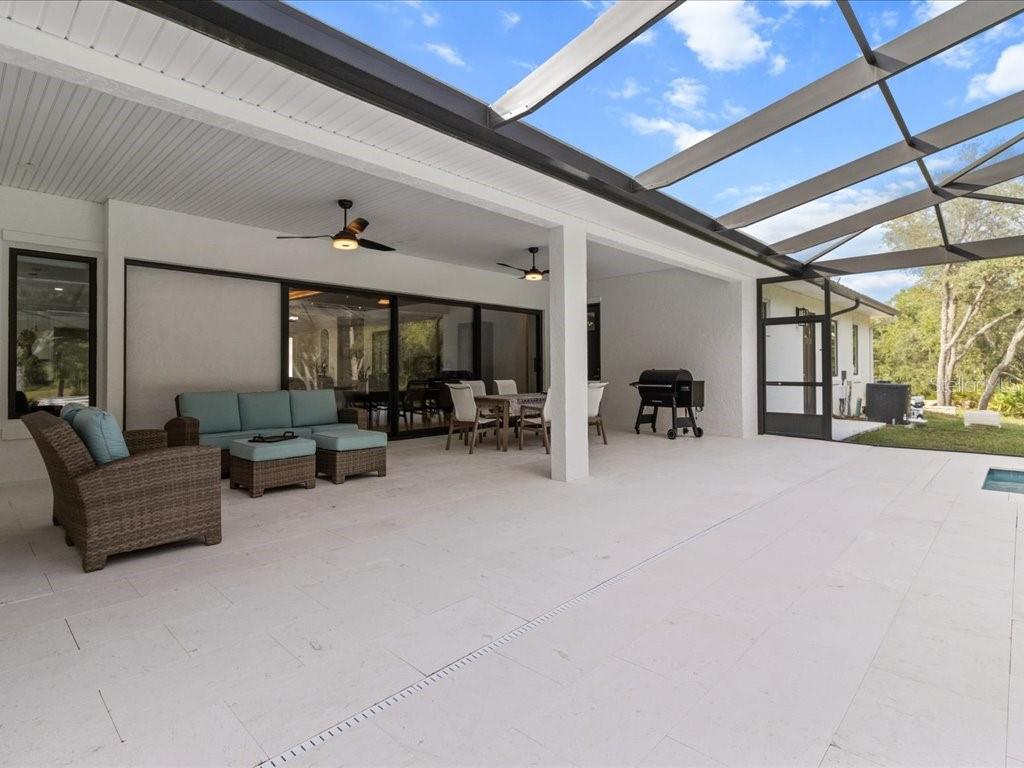 3937 West Shadow Creek Loop Lecanto, FL 34461 - Photo 27 of 65 a living room with furniture and a large window