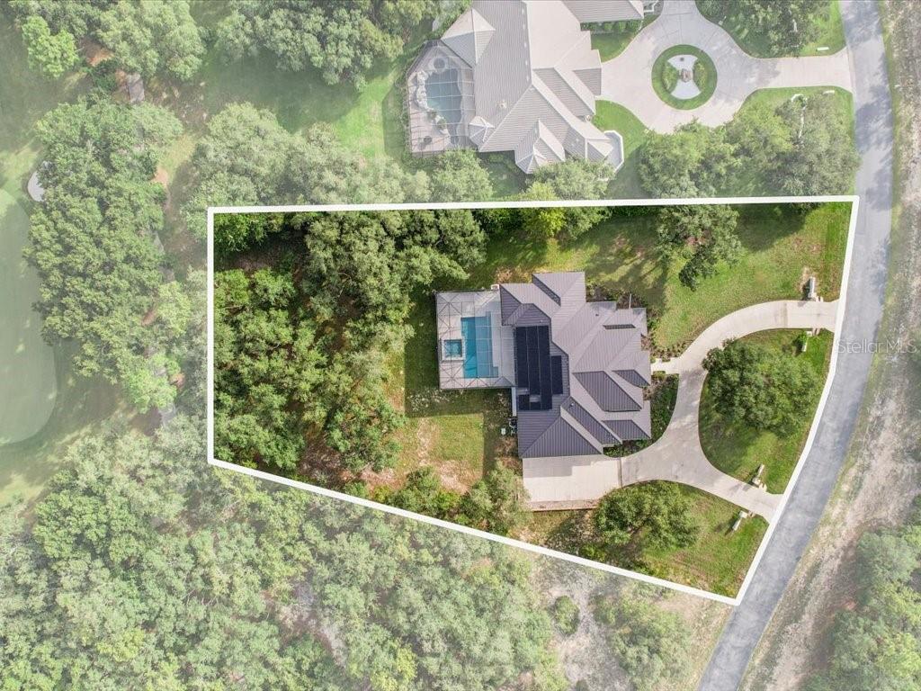 3937 West Shadow Creek Loop Lecanto, FL 34461 - Photo 4 of 65 view of a balcony with wooden floor and lake view