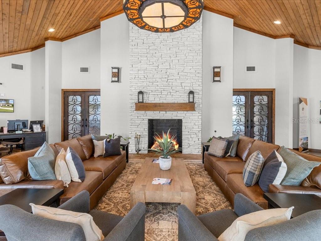 3937 West Shadow Creek Loop Lecanto, FL 34461 - Photo 57 of 65 a living room with furniture fireplace and a fireplace