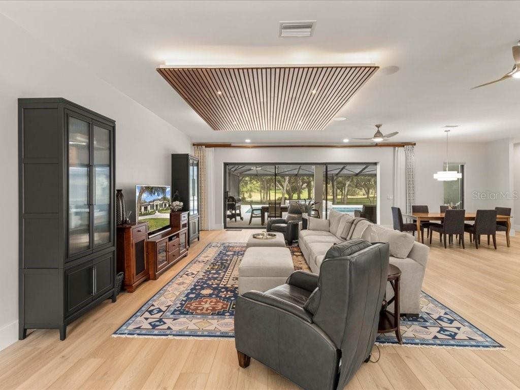 3937 West Shadow Creek Loop Lecanto, FL 34461 - Photo 8 of 65 a living room with furniture and a table