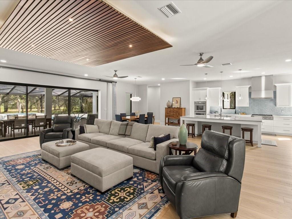 3937 West Shadow Creek Loop Lecanto, FL 34461 - Photo 9 of 65 a living room with furniture and a large window