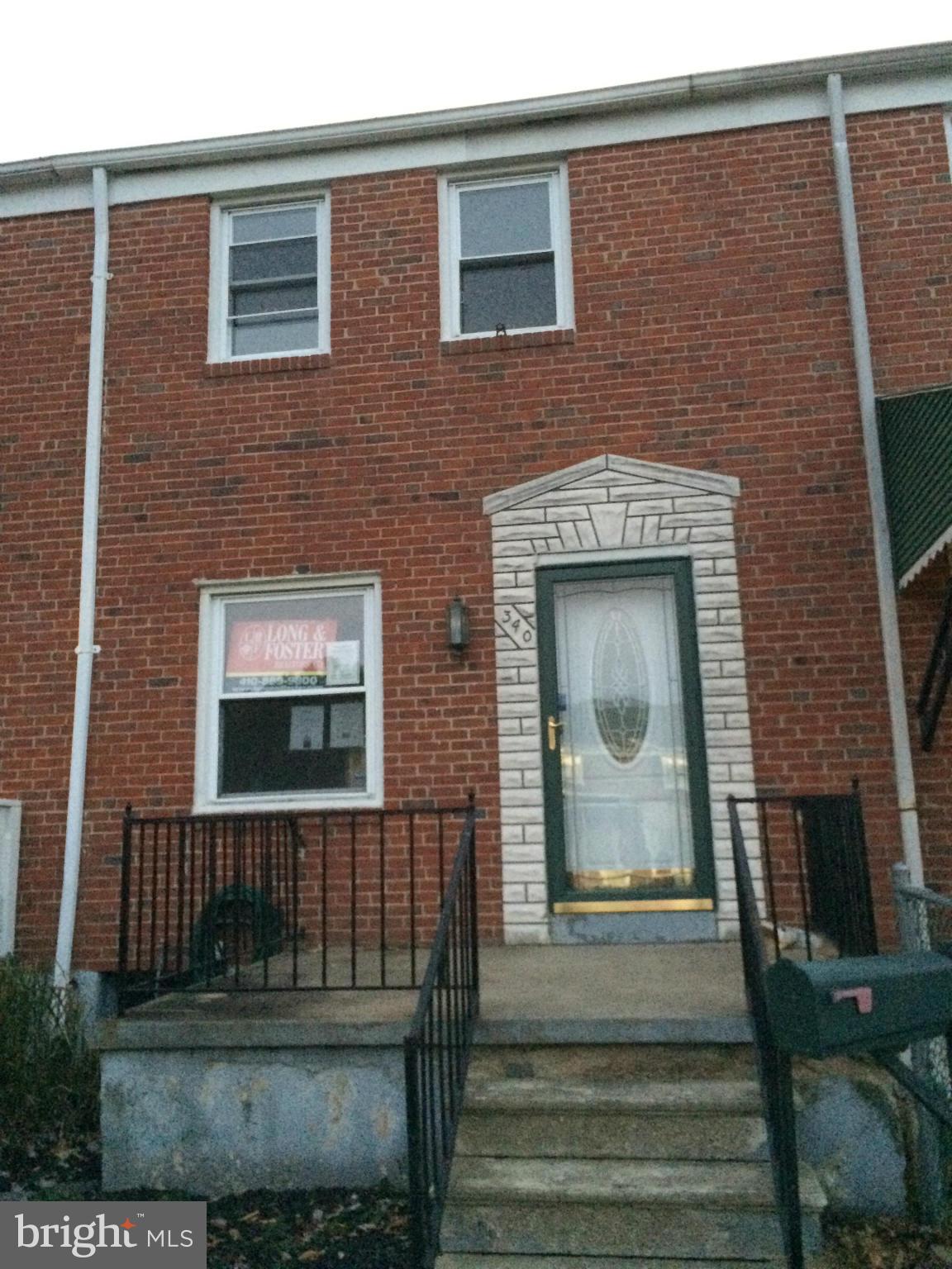 340 Grovethorn Road Baltimore, MD 21220 - Photo 1 of 17 a front view of a house with stairs