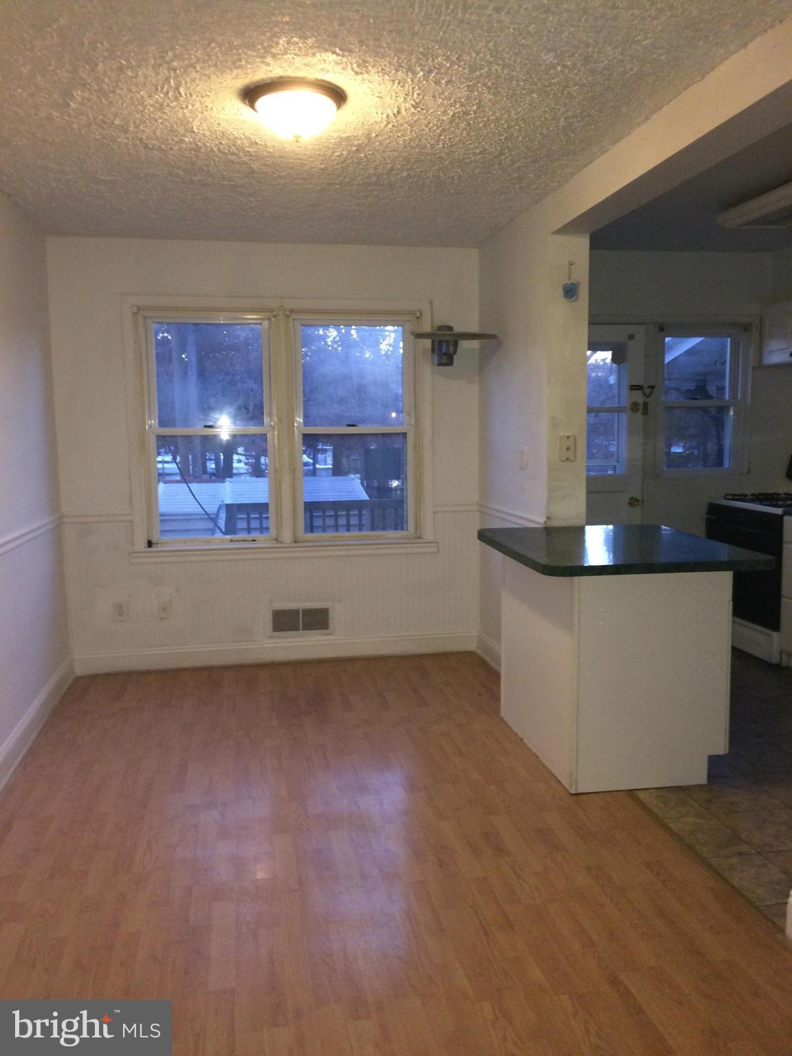 340 Grovethorn Road Baltimore, MD 21220 - Photo 14 of 17 an empty room with a fireplace