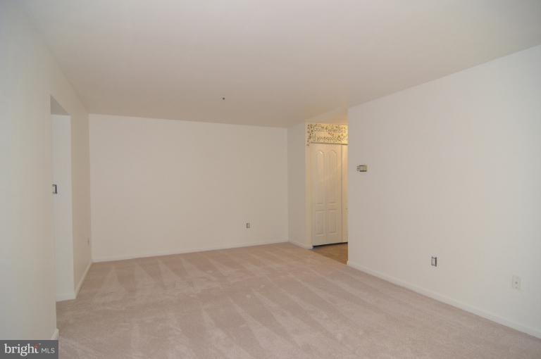 8571 Falls Run Road, Unit A Ellicott City, MD 21043 - Photo 9 of 14 Living Room