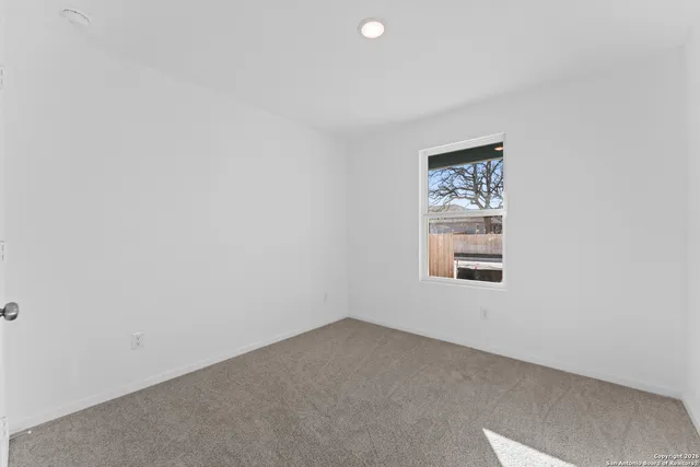 an empty room with a window