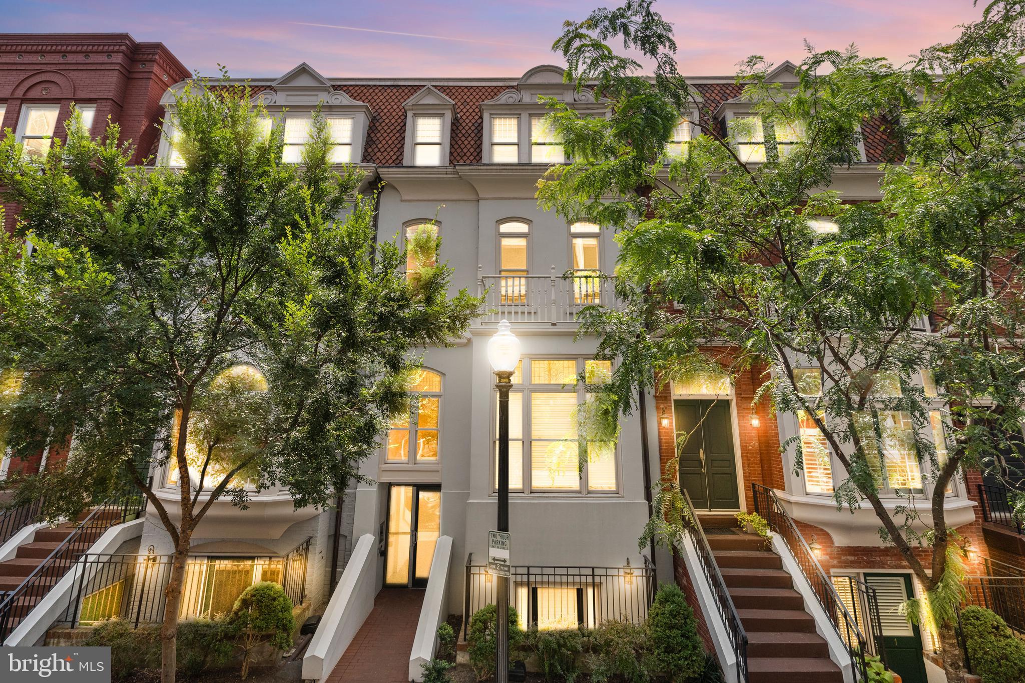a view of a building with a tree
