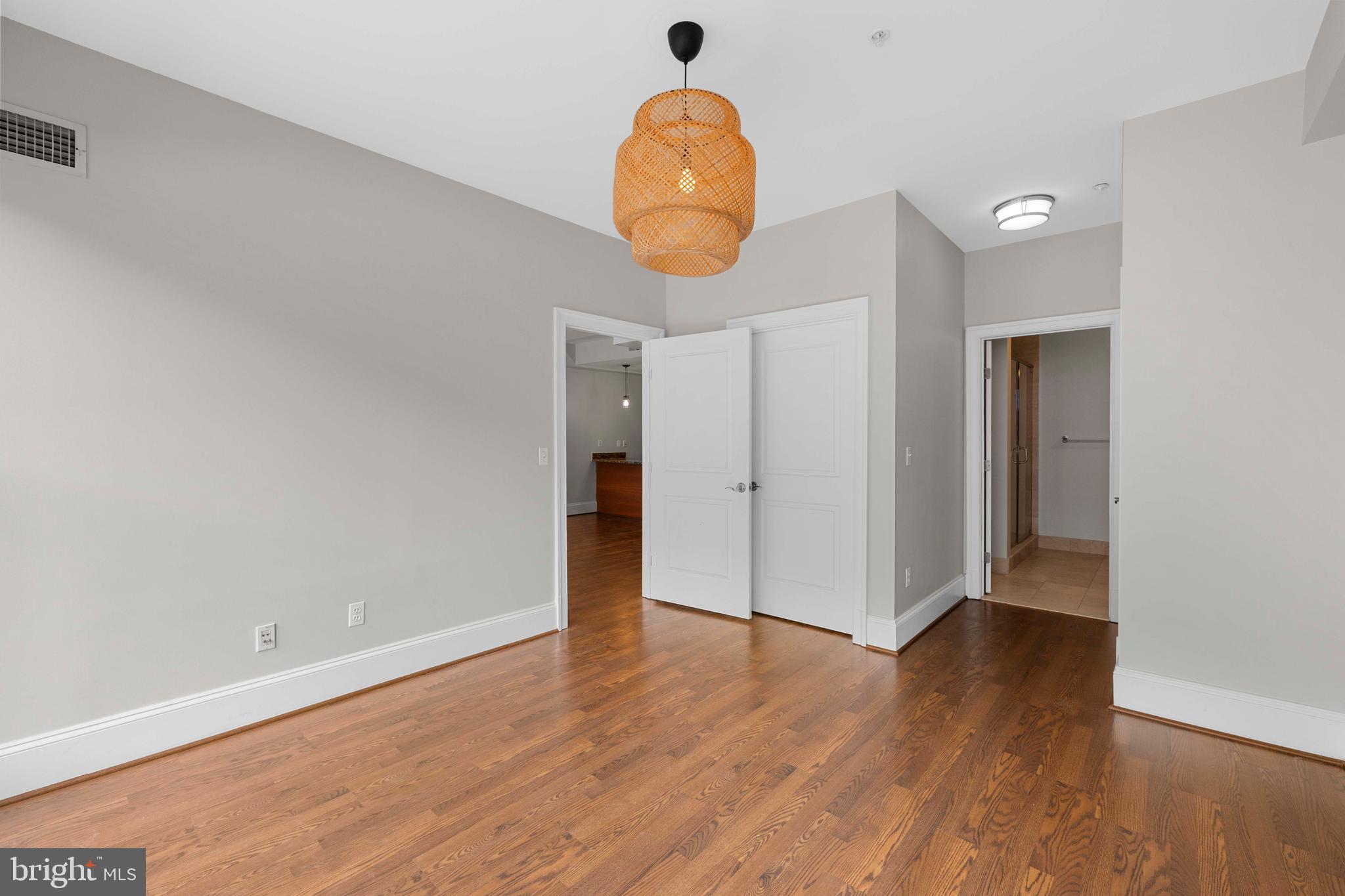 1830 Jefferson Place Northwest, Unit 12 Washington, DC 20036 - Photo 12 of 27 a view of a hallway with wooden floor