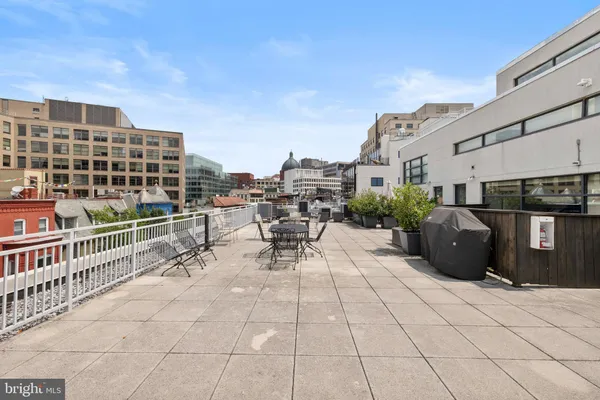 a view of a terrace with chairs