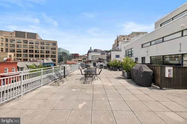 a view of a terrace with chairs