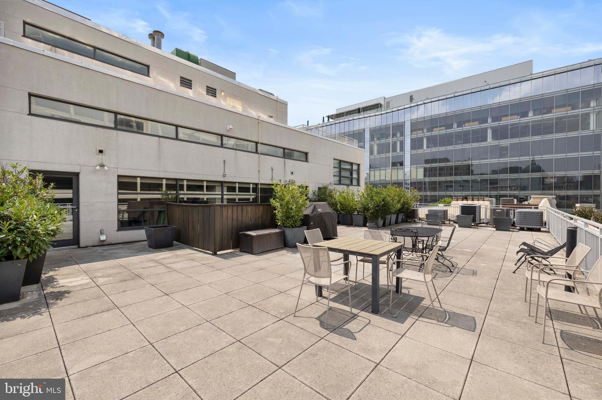 1830 Jefferson Place Northwest, Unit 12 Washington, DC 20036 - Photo 27 of 27 a view of backyard with outdoor seating a patio and plants