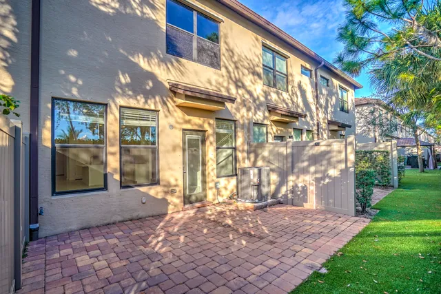 a view of a building with a yard