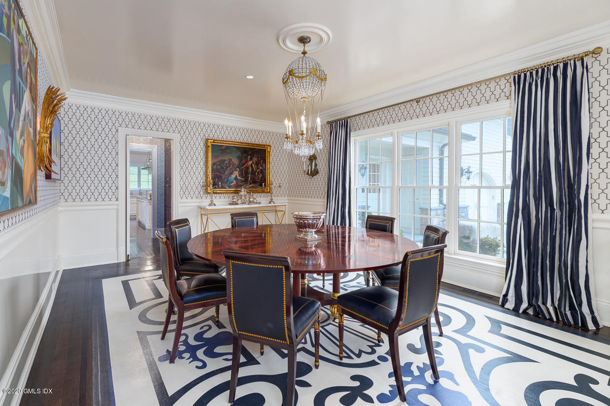 7 Chieftans Road Greenwich, CT 06831 - Photo 8 of 37 a view of a dining room with furniture window and wooden floor