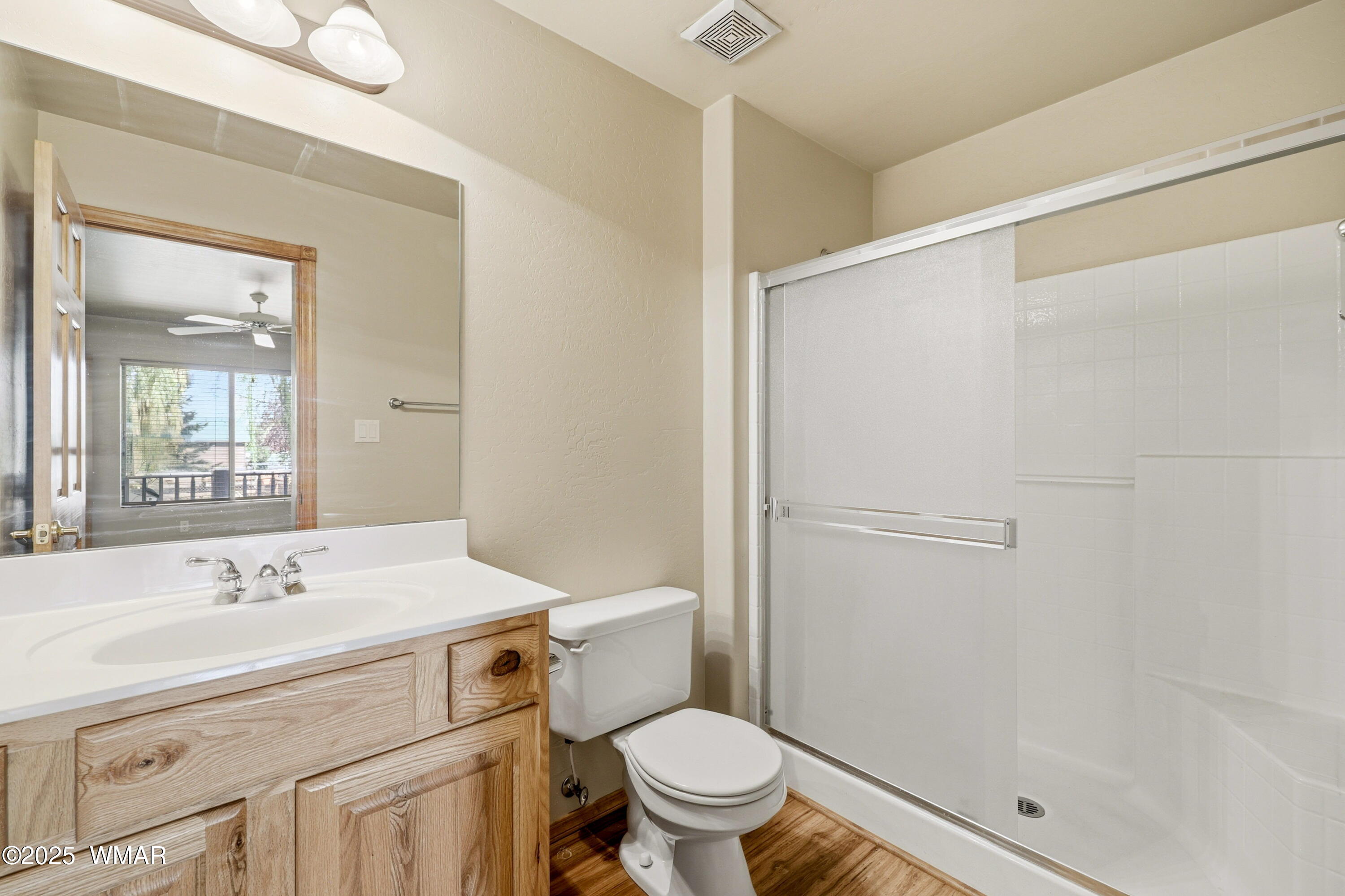 2348 South Buffalo Loop Overgaard, AZ 85933 - Photo 25 of 38 a bathroom with a sink toilet and shower