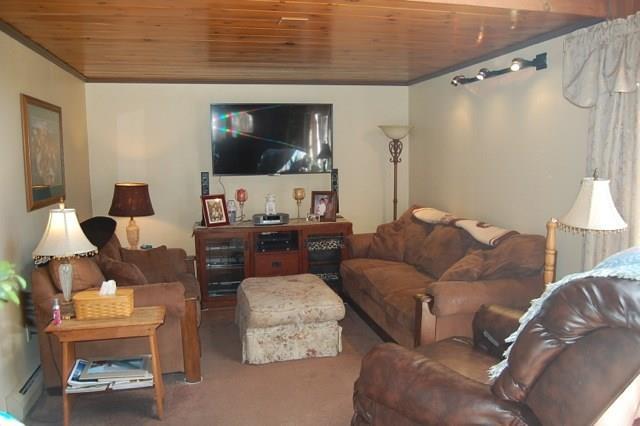 522 Shady Nook Road West Newfield, ME 04095 - Photo 7 of 30 Living room w/ knotty pine ceiling.