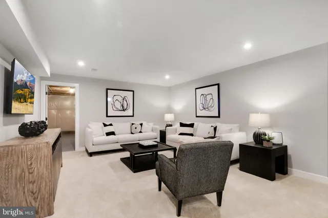 a living room with furniture and a couch