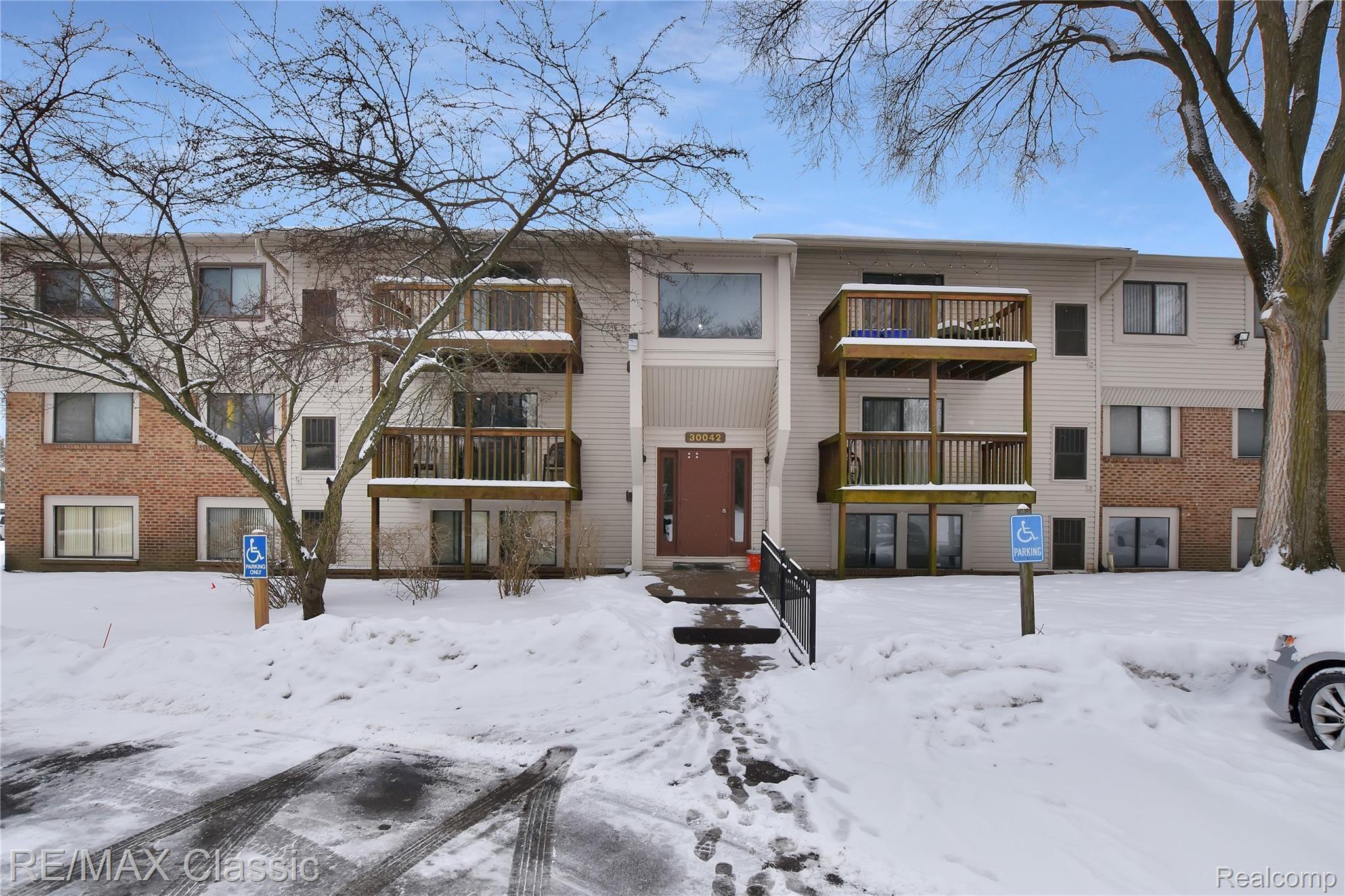 30042 12 Mile Road, Unit 60 Farmington, MI 48334 - Photo 1 of 9 A_Front.jpg