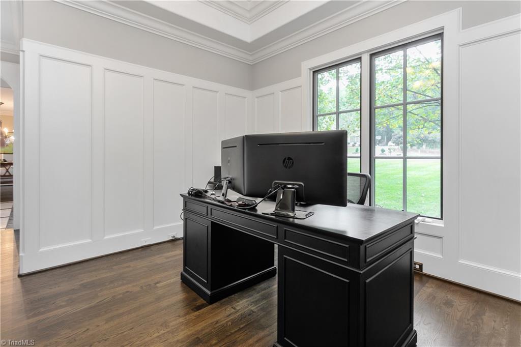 8302 Linville Oaks Drive Oak Ridge, NC 27310 - Photo 12 of 46 Private study area on the main level that can be accessed off the Primary bedroom or the front hallway.